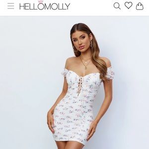 White and pink floral printed dress. Size Medium. New with tags
